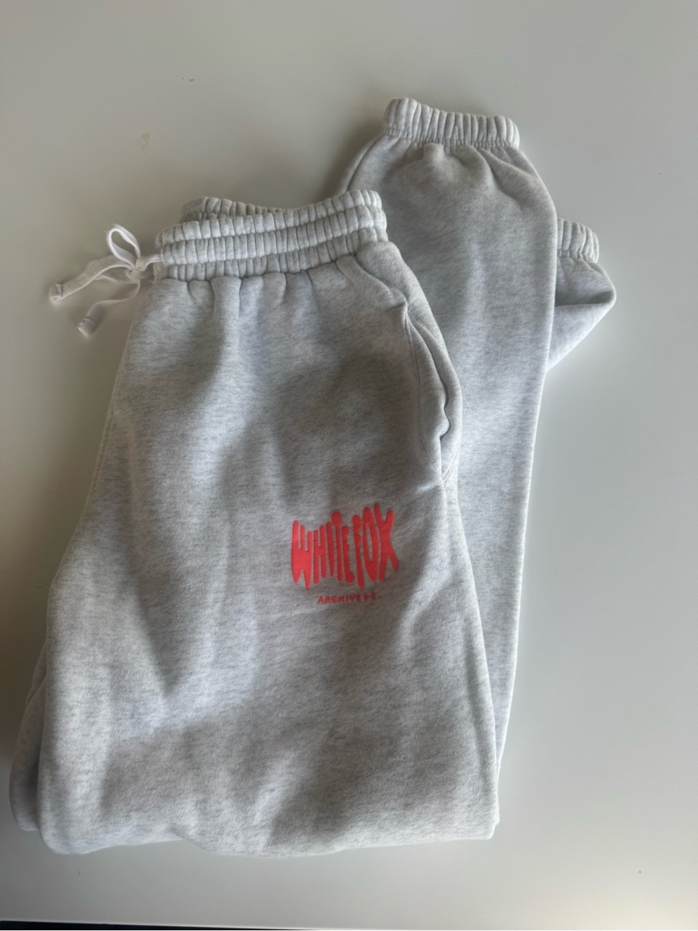 White Fox Boutique Light Gray Track Pants with Coral Pink Logo